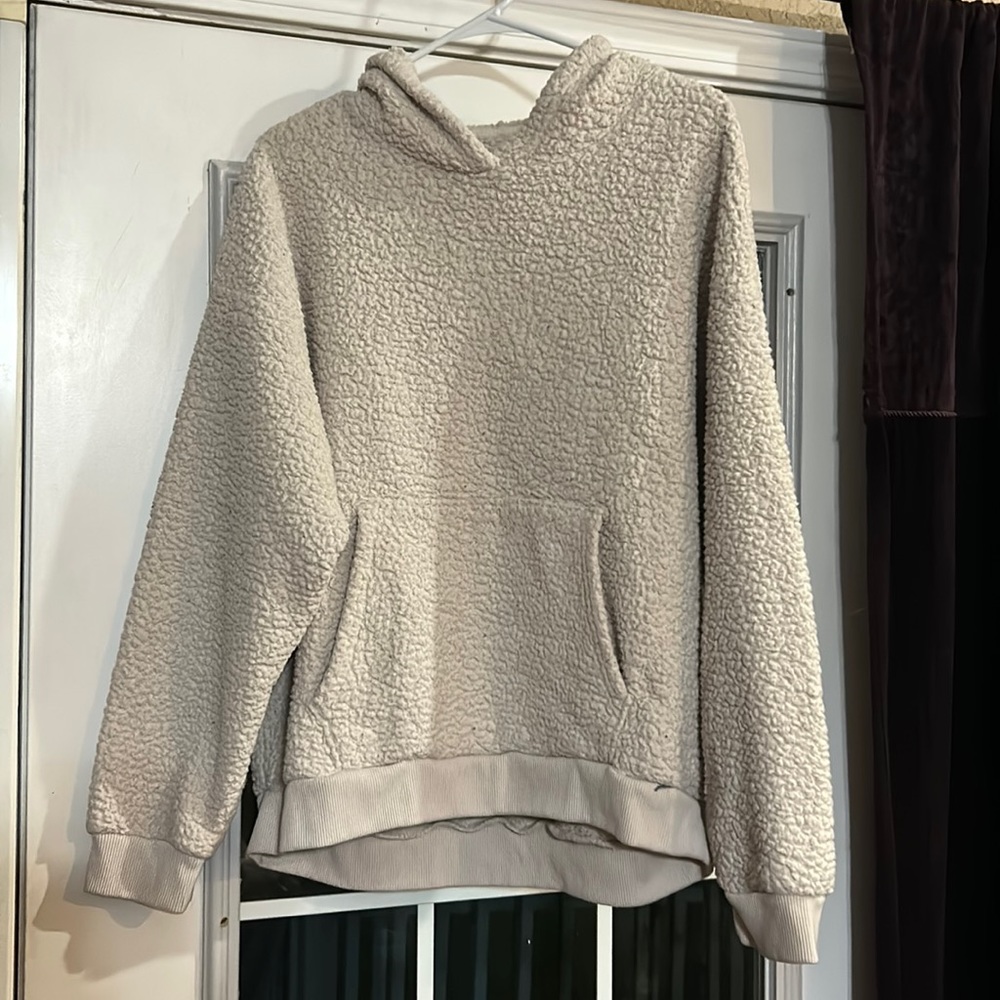 white fuzzy sweater